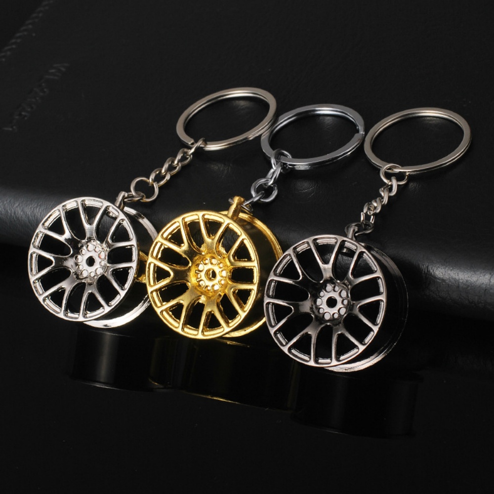 Men'S Fashion Hub - Creatieve wielnaaf sleutelhanger metalen auto modificatie